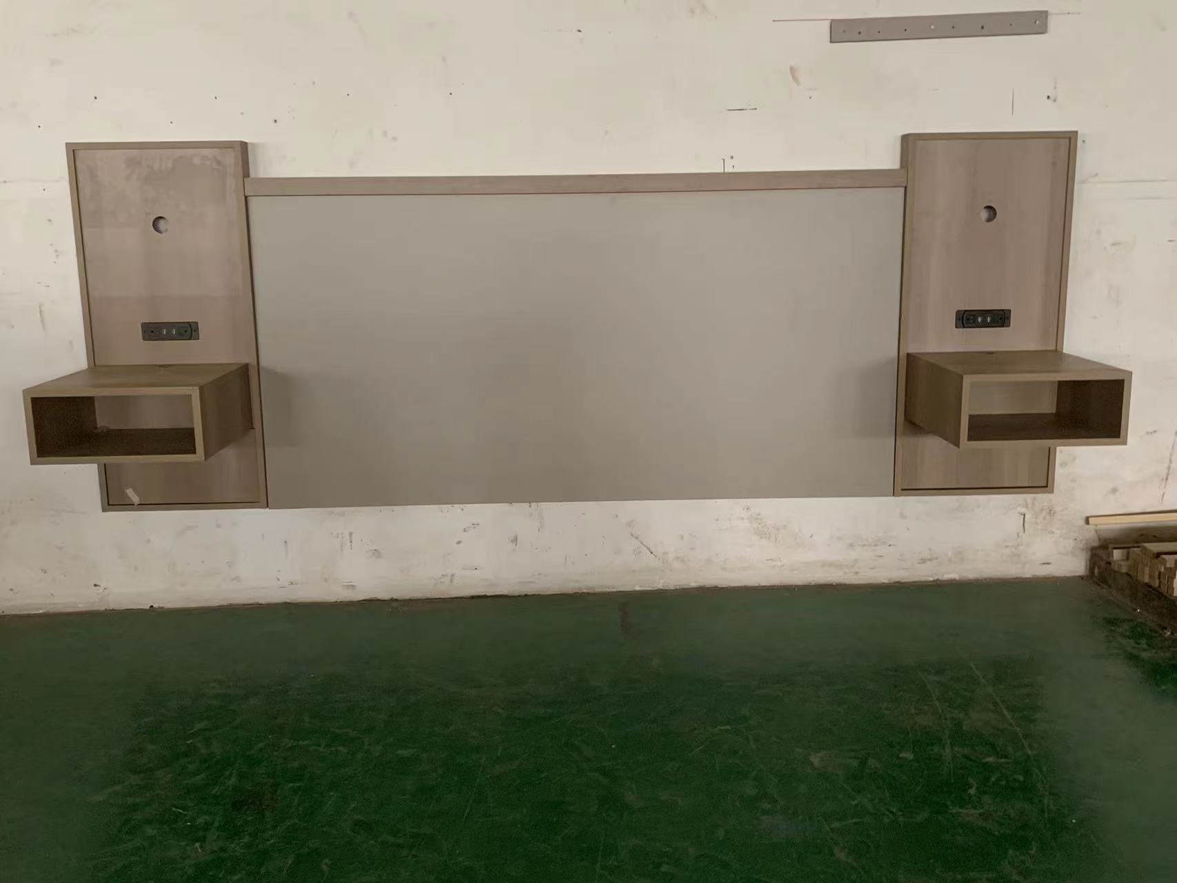 Hotel casegoods headboard and floating nightstand with electrical outlet