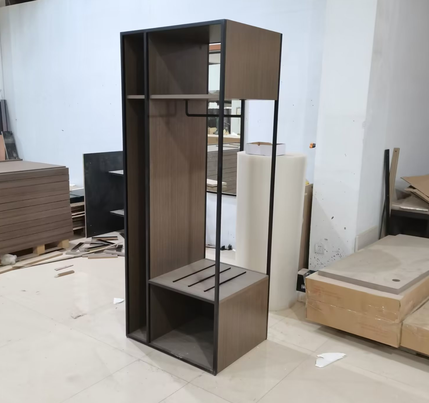 open closet with nested luggage bench