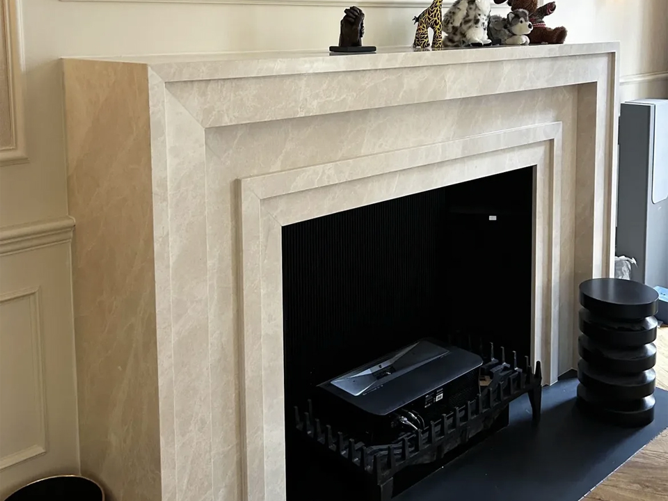 Emperador light Spanish marble fireplace