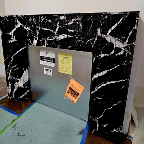 Calacatta Black marble fireplace mantel