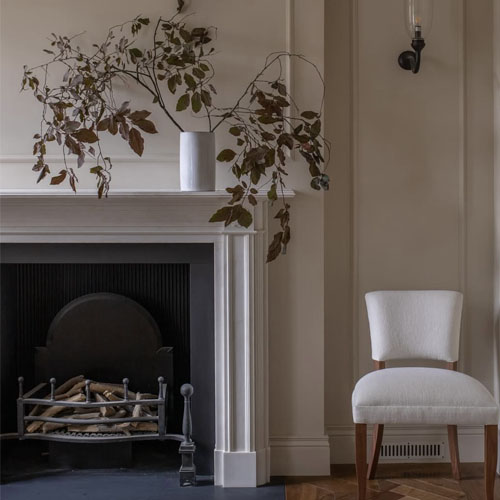 marble fireplace mantel with sleek panelling design