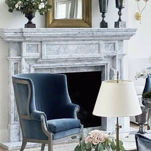 white marble fireplace mantel in great room