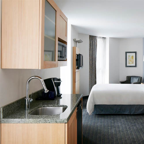 Compact hospitality kitchenette cabinet for suites