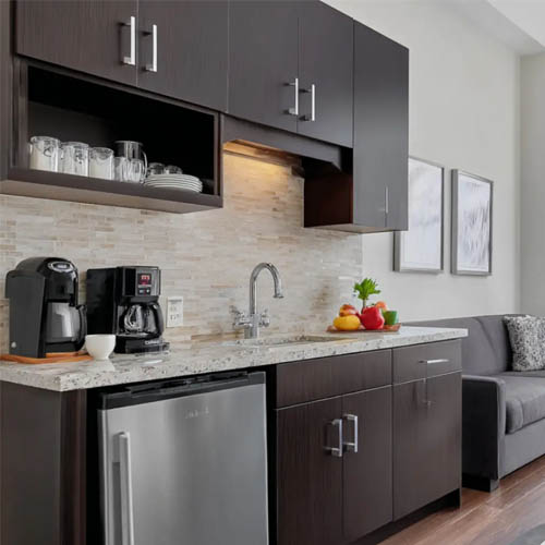 Guest room kitchenette cabinet