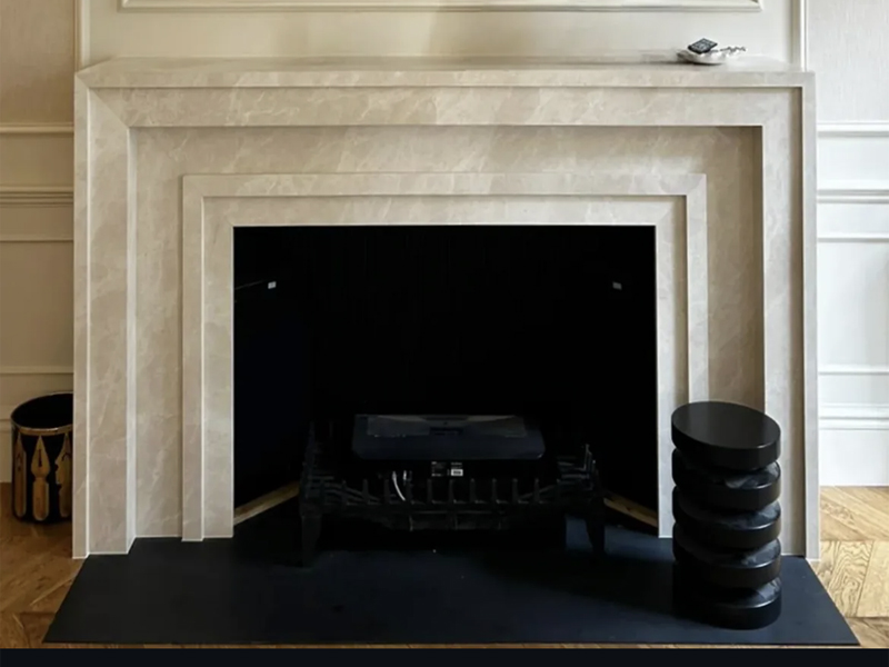 emperador light marble fireplace mantel.jpg