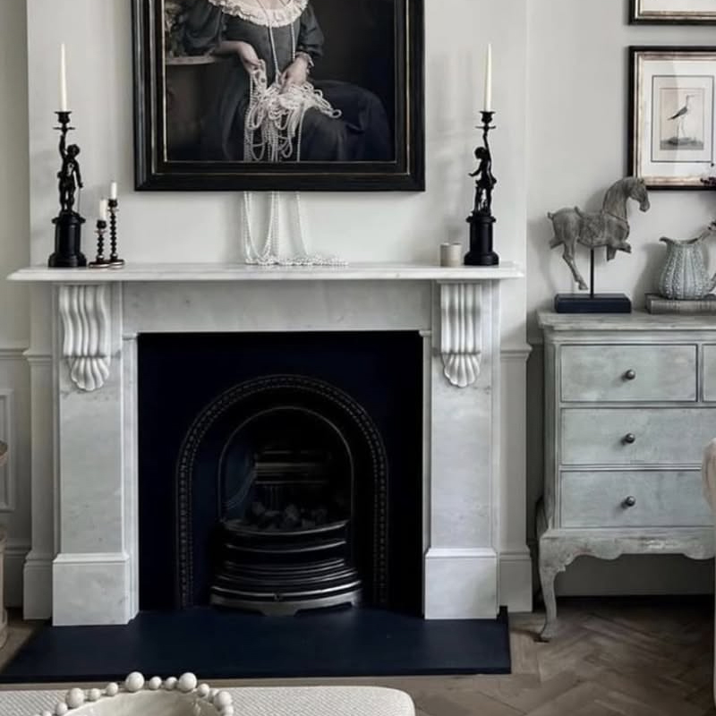 benefit of marble fireplace mantel and surround.jpg